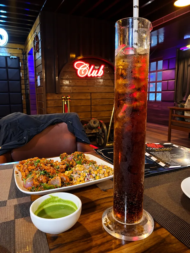 A tall iced drink from the bar at BAR CODE in Civil Lines, Prayagraj.