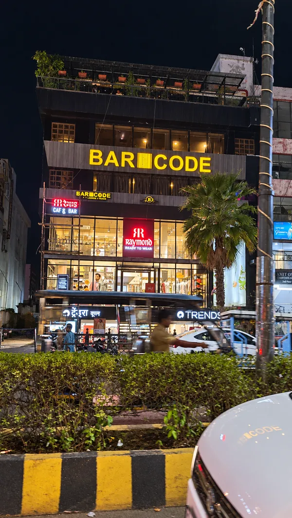 The BAR CODE bar and restaurant in Civil Lines, Prayagraj, at night.