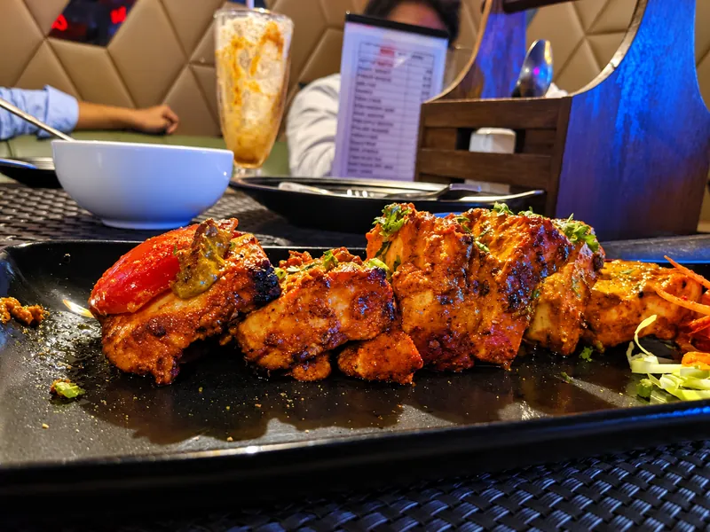 Charred Chicken Tikka from the tandoor at BAR CODE restaurant in Prayagraj.